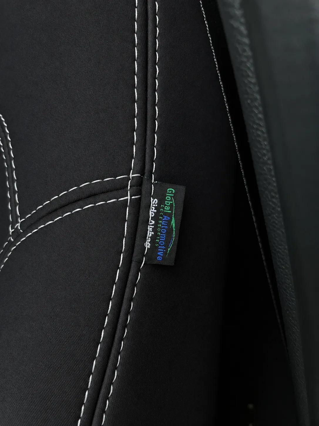 Ford Everest Next Gen Platinum neoprene seat cover with airbag-compatible tag stitched into the side seam